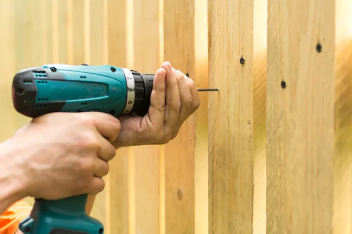 Preventing Tree Damage with Proper Wood Fence Installation Houston, TX