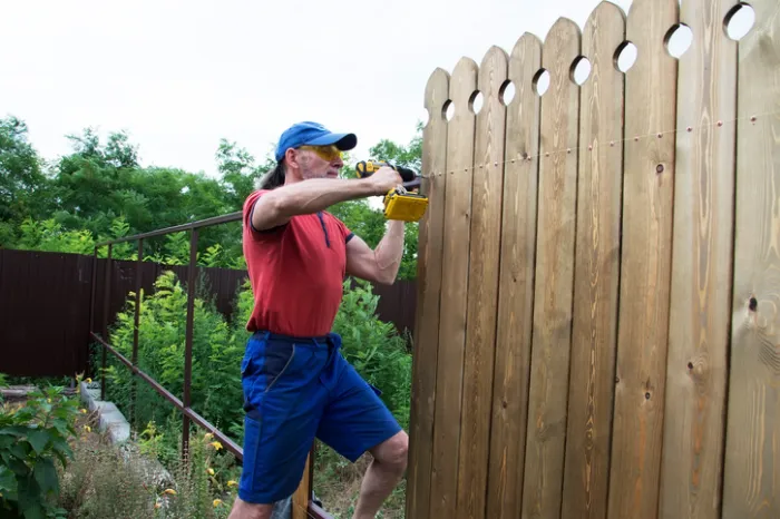 Preventing Tree Damage with Proper Wood Fence Installation in Houston, TX